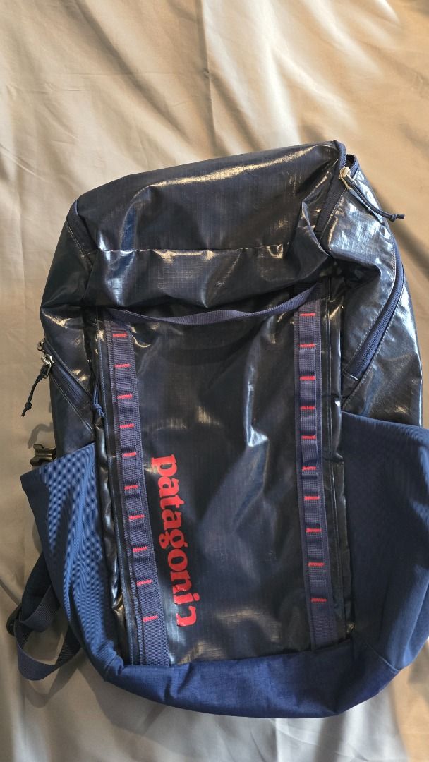 Patagonia Black Hole 32L (Category: Backpacks) located in Pasay City. Submitted by f_sy123 (Listing ID 1414690035, Image 1). Description: - Navy blue Patagonia backpack - Durable and water-resistant material - Features the Patagonia logo - Multiple compartments and straps for organization - Ideal for everyday use and outdoor adventures.