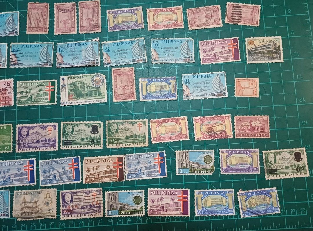 Philippine Stamps Collection (Category: Stamps & Prints) located in Bacoor. Submitted by styleph (Listing ID 1414773435, Image 1). Description: - Philippine stamp collection. - Features various designs and denominations. - Includes stamps with buildings, portraits, and historical imagery. - Stamps of different sizes and colors. - Diverse selection for philatelists and collectors. - Stamps from different eras..