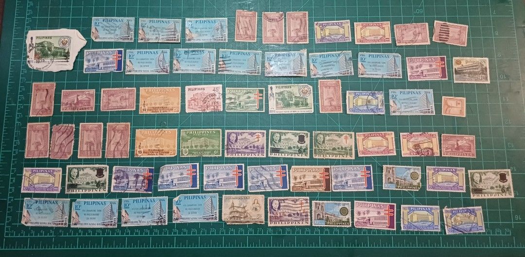 Philippine Stamps Collection (Category: Stamps & Prints) located in Bacoor. Submitted by styleph (Listing ID 1414773435, Image 3). Description: - Philippine stamp collection. - Features various designs and denominations. - Includes stamps with buildings, portraits, and historical imagery. - Stamps of different sizes and colors. - Diverse selection for philatelists and collectors. - Stamps from different eras..