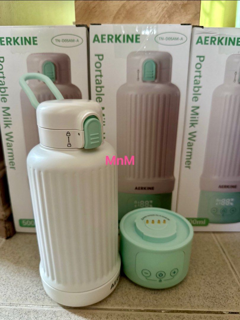 Portable milk warmer (Category: Breastfeeding & Bottle Feeding) located in Davao. Submitted by minime_dvo (Listing ID 1414666474, Image 2). Description: Portable milk warmer (16oz capacity) - fresh drop from 🇺🇸 10,000 mAh and detachable base for easier cleaning Limited stocks only! PM for inquiries! 🍼.