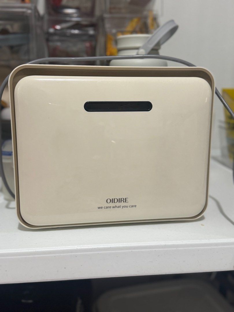 Portable UV Sterilizer and Dryer (Category: Breastfeeding & Bottle Feeding) located in Cainta. Submitted by cloverscloset.ph (Listing ID 1414664025, Image 2). Description: Travel sterilizer and dryer. Can fit 3 bottles. UV Sterilizer with Dryer 220v.