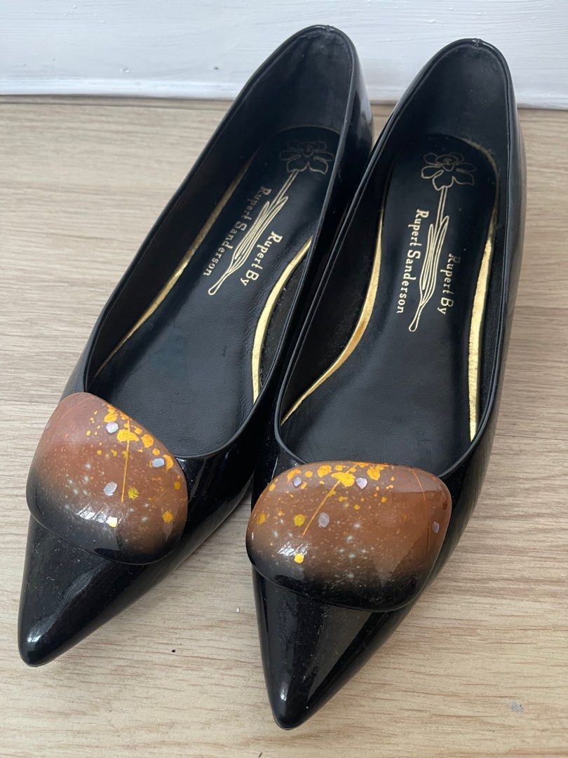 Rupert Sanderson Black Flats (Category: Flats & Sandals) located in Quezon City. Submitted by blamson0804 (Listing ID 1414740231, Image 3). Description: - Rupert Sanderson black flats - Pointed toe design - Unique decorative accent - Gold detailing on insoles - Brand name on insoles and soles - Size: 36 1/2 - Glossy finish - Barely used, no more box - Best fit for wide feet (my feet are narrow so slightly loose for me).
