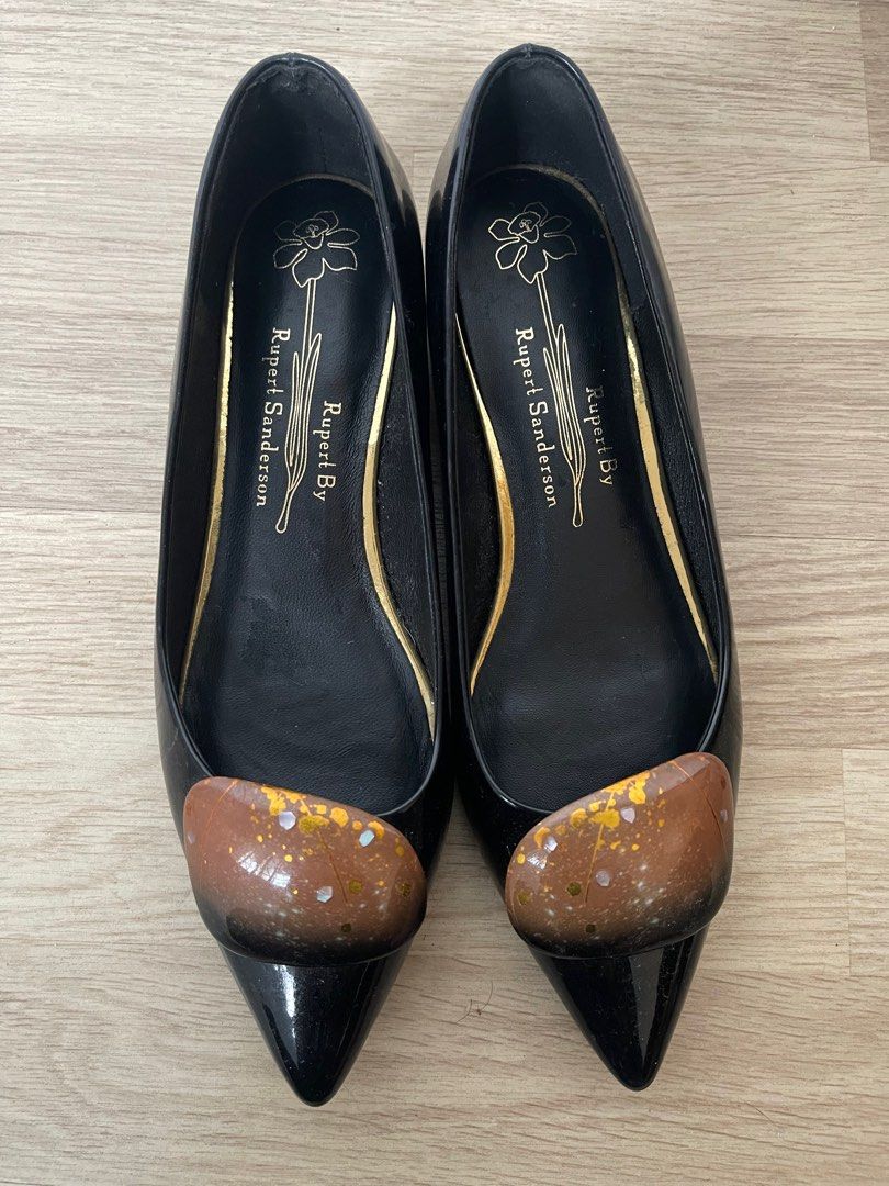 Rupert Sanderson Black Flats (Category: Flats & Sandals) located in Quezon City. Submitted by blamson0804 (Listing ID 1414740231, Image 2). Description: - Rupert Sanderson black flats - Pointed toe design - Unique decorative accent - Gold detailing on insoles - Brand name on insoles and soles - Size: 36 1/2 - Glossy finish - Barely used, no more box - Best fit for wide feet (my feet are narrow so slightly loose for me).