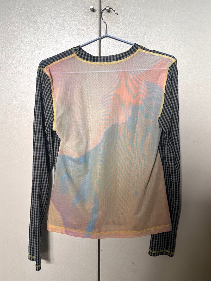 Sheer Checkered Long Sleeve Top (Category: Longsleeves) located in Makati City. Submitted by mint___condition (Listing ID 1414674654, Image 2). Description: - Long-sleeved top - Sheer and lightweight - Round neckline - Colorful, abstract back design.