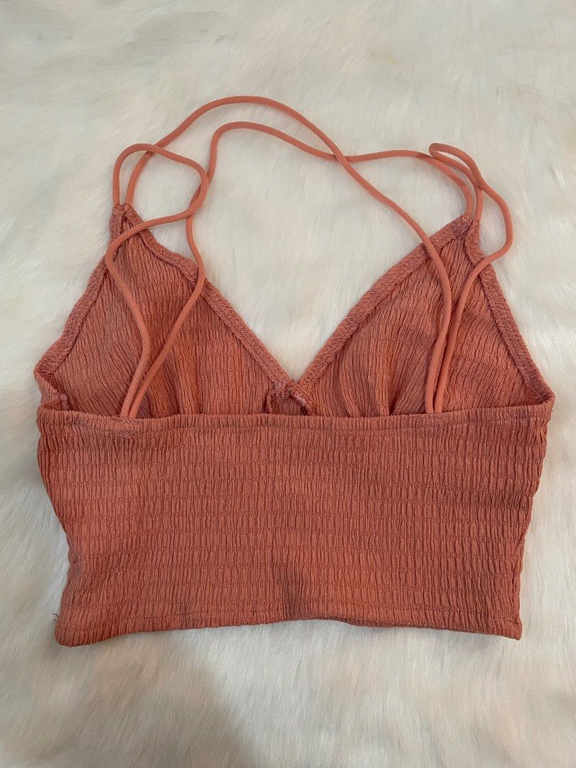 Shein Crisscross Crop Top (Category: Others Tops) located in Manila. Submitted by dbbjll (Listing ID 1414797905, Image 2). Description: - Shein crop top - Size: XS - Design: Crisscross back - Features: V-neck, thin straps - Fabric: Textured - Color: Muted coral/terracotta.