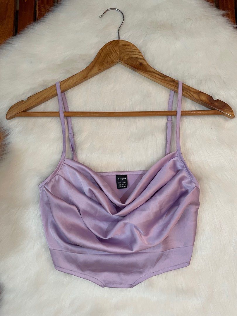 Shein Satin Cowl Neck Crop Top (Category: Sleeveless) located in Manila. Submitted by dbbjll (Listing ID 1414797898, Image 1). Description: - Shein crop top - Cowl neck design - Adjustable straps - Made of satin - Light purple color - Size: XS - Great for special occasions.