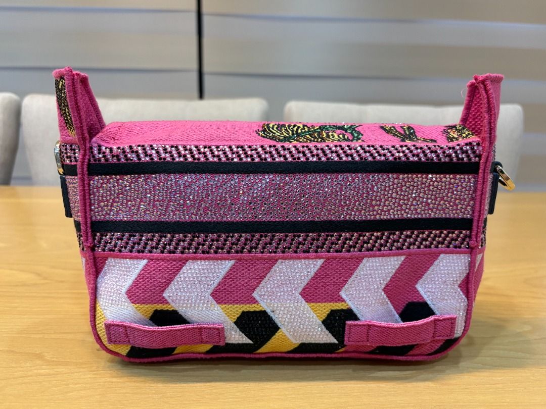 Small Pink Studded CHRISTIAN DIOR Canvas Bag (Category: Shoulder Bags) located in Cebu City. Submitted by smartvogue (Listing ID 1414744650, Image 3). Description: Authentic, coded Dimensions: 6.25” H x 8.5” W x 3” D Flaws: Missing sling Being sold for 6,500 Euros elsewhere Get this for a bargain! 📍Cebu City Disclaimer: The seller has no association or affiliation with any of the brands featured across the listings. All rights are reserved to th