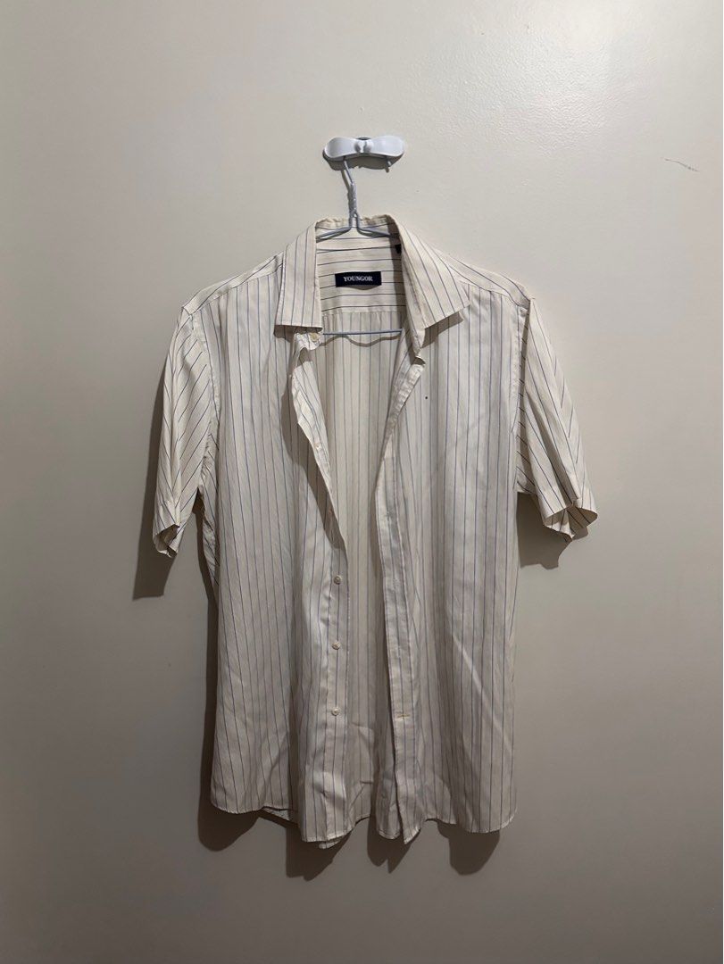 Striped Short Sleeve Light-colored Shirt (Category: Tshirts & Polo Shirts ) located in Calamba. Submitted by andi.love (Listing ID 1414631531, Image 1). Description: - Youngman short sleeve shirt - Vertical stripes - Collared neckline - Button-down closure - Classic fit - Lightweight fabric - Simple and versatile design.