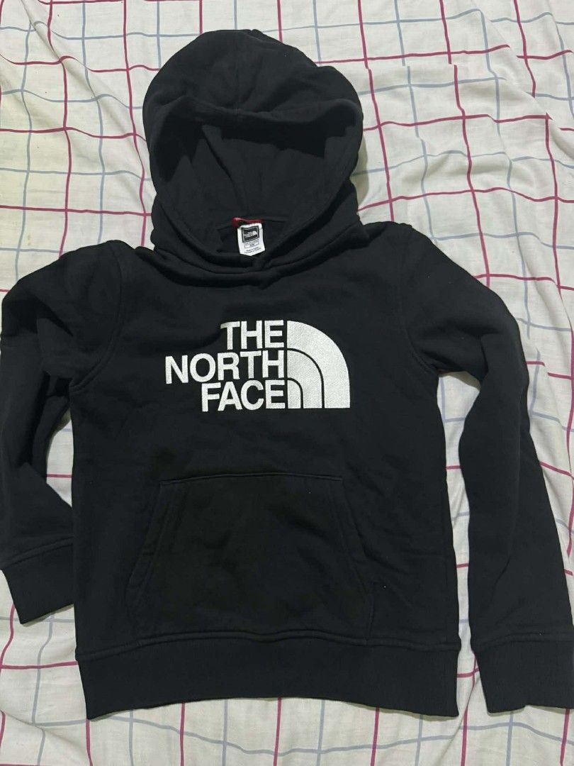 The North Face Black Hoodie (Category: Hoodies) located in San Juan City. Submitted by che2x22 (Listing ID 1414660515, Image 1). Description: -youth/junior medium - The North Face kids' hoodie - Color: Black - Features a hood and front pocket - The North Face logo on the front - Includes original tag -used once during our HK Trip (personal used).