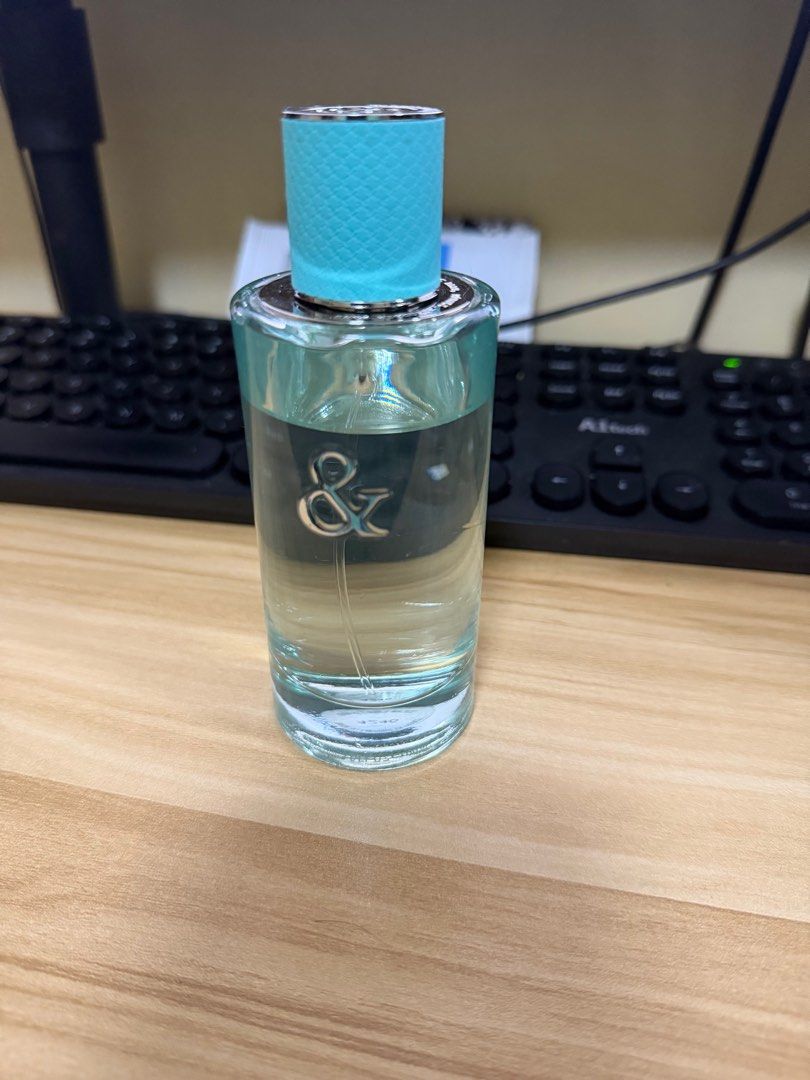Tiffany & Co. Eau de Parfum (Category: Fragrance & Deodorants) located in San Juan City. Submitted by vmdln (Listing ID 1414648157, Image 1). Description: - Authentic Tiffany & Co. Eau de Parfum - Features a light blue cap - Clear glass bottle with the Tiffany & Co. logo .