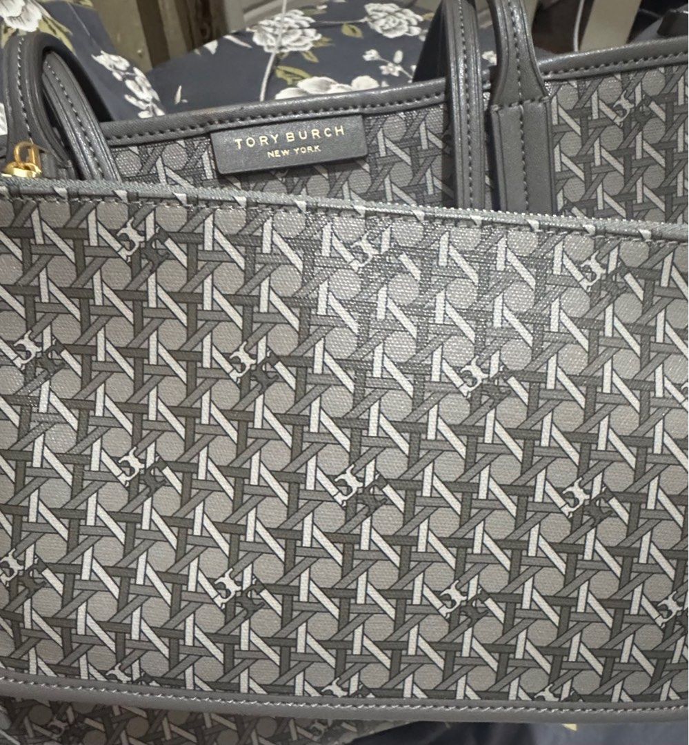 Tory Burch Ever-Ready Zip Tote Bag (Category: Luxury Bags & Wallets) located in Manila. Submitted by jbrocloset (Listing ID 1414655402, Image 3). Description: - Tory Burch Tote Bag - Gray geometric pattern - Top zipper closure - Matching pouch included - Light beige interior lining - Double top handles - Rectangular shape - Tory Burch logo visible.