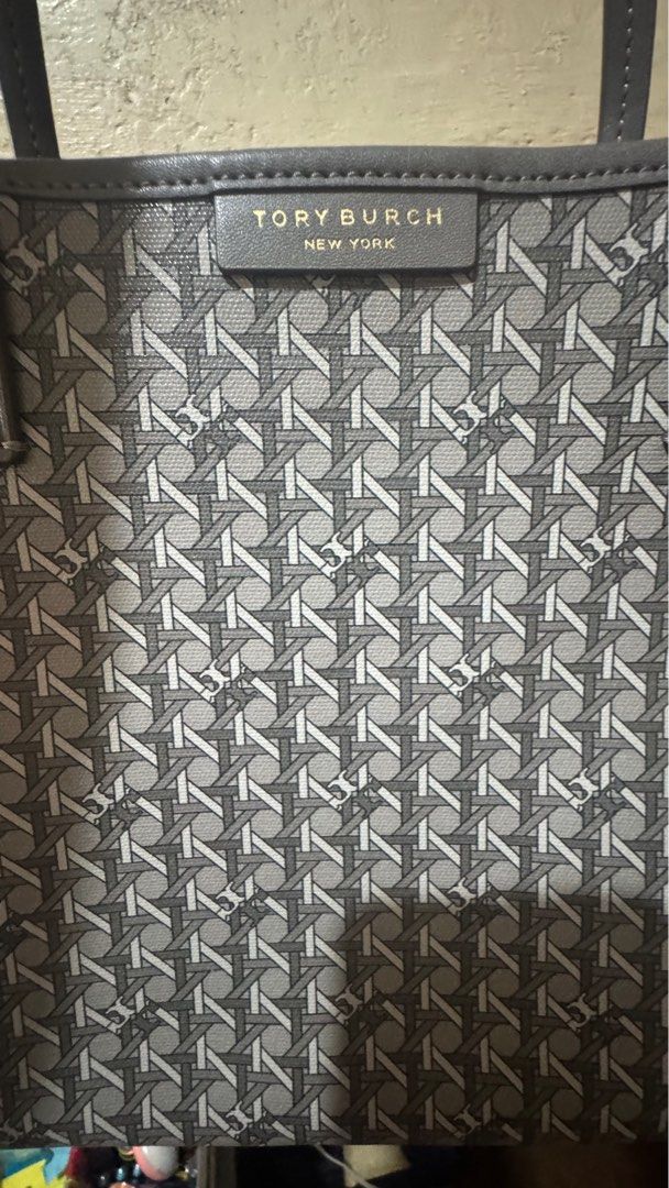 Tory Burch Ever-Ready Zip Tote Bag (Category: Luxury Bags & Wallets) located in Manila. Submitted by jbrocloset (Listing ID 1414655402, Image 2). Description: - Tory Burch Tote Bag - Gray geometric pattern - Top zipper closure - Matching pouch included - Light beige interior lining - Double top handles - Rectangular shape - Tory Burch logo visible.