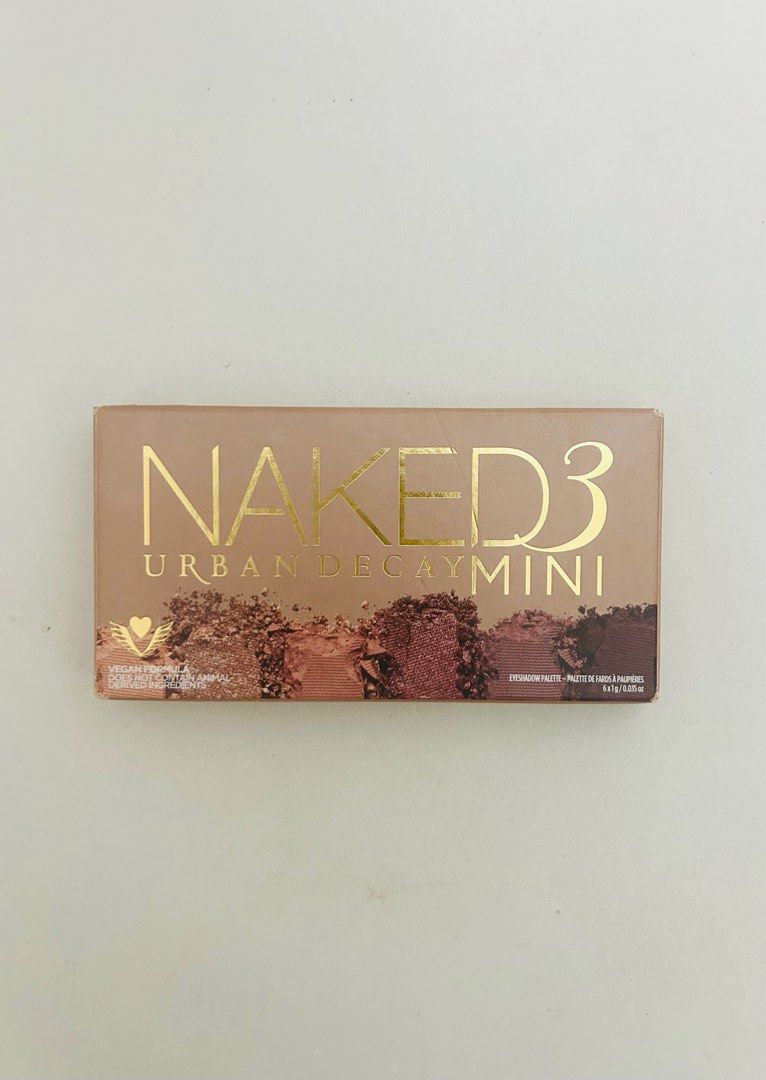 Urban Decay Naked3 Mini Eyeshadow Palette (Category: Makeup) located in Manila. Submitted by justoverflows (Listing ID 1414761973, Image 3). Description: Urban Decay Naked 3 Mini Eyeshadow Palette Bought from Sephora in California, USA Brand new, never swatched/never used Six rose-toned neutral shades 6.1 g Message me for details! :).