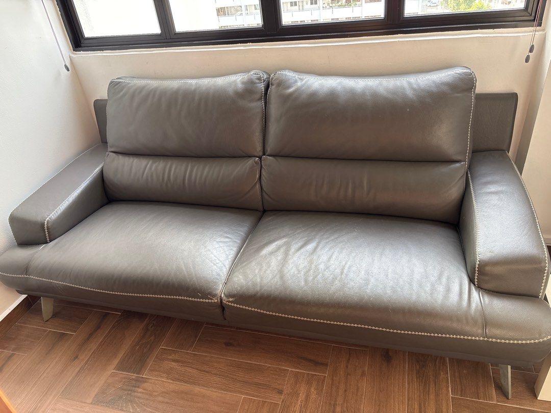 Used Sofa - Solid Frame (Category: Sofas) located in Singapore. Submitted by TWtweens (Listing ID 1414732125, Image 3). Description: - Used sofa - Solid wooden frame - Visible springs and support structure - Underside shows wear and tear - Perfect for a project or budget buy - Sold as is.
