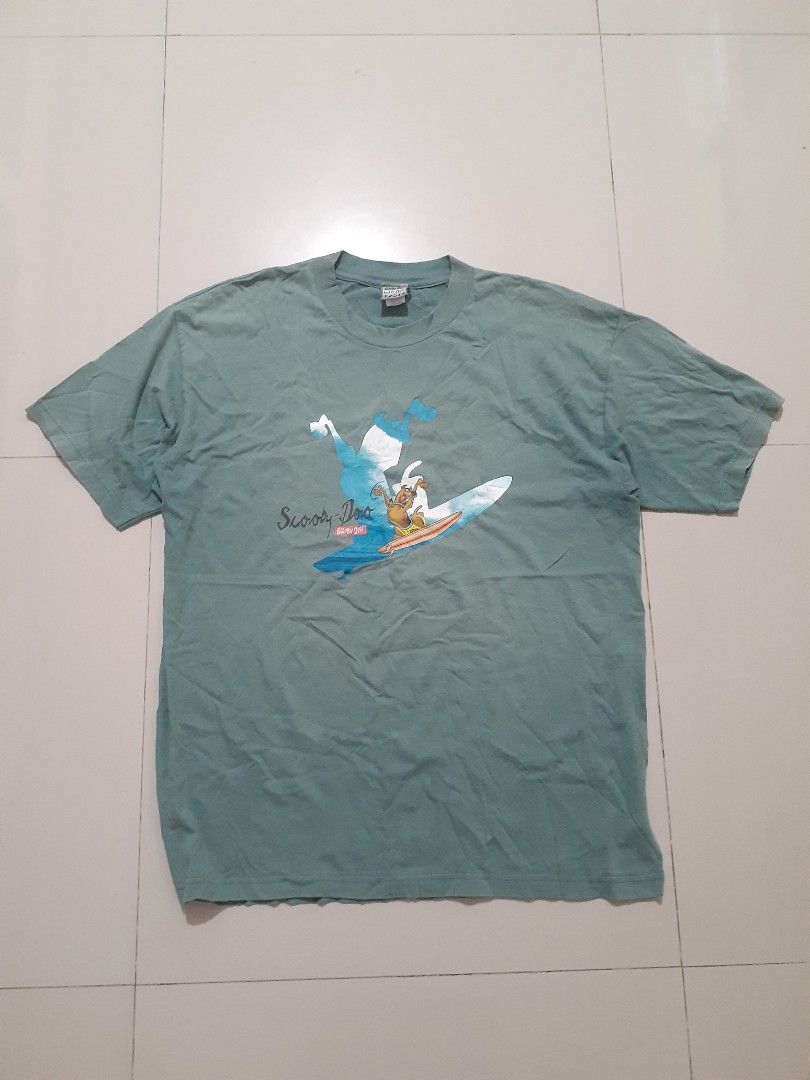 Vintage 1998 Cartoon network Scooby Doo Tee (Category: Tshirts & Polo Shirts ) located in Candaba. Submitted by ThrifthingsPH02 (Listing ID 1414724590, Image 1). Description: Selling Vintage 1998 Cartoon network Scooby Doo Tee Official Scooby Doo Cartoon Network Tag Dated 1998 Size XL 24" Width armpit to armpit 31" Length top to bottom Very Good condition for its age Flaws : Hairline on print , 2 Pinhole sa Likod bandang Balikat at sa laylayan Me