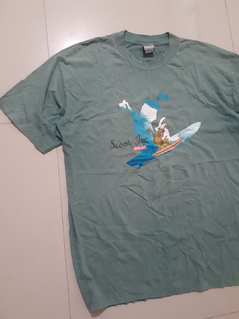 Vintage 1998 Cartoon network Scooby Doo Tee (Category: Tshirts & Polo Shirts ) located in Candaba. Submitted by ThrifthingsPH02 (Listing ID 1414724590, Image 2). Description: Selling Vintage 1998 Cartoon network Scooby Doo Tee Official Scooby Doo Cartoon Network Tag Dated 1998 Size XL 24" Width armpit to armpit 31" Length top to bottom Very Good condition for its age Flaws : Hairline on print , 2 Pinhole sa Likod bandang Balikat at sa laylayan Me