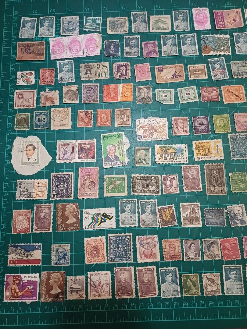 Vintage Stamps Collection (Category: Stamps & Prints) located in Bacoor. Submitted by styleph (Listing ID 1414778670, Image 1). Description: - Vintage stamp collection - Features stamps from different countries and eras - Includes stamps with portraits and historical figures - Diverse imagery and designs - Variety of sizes and shapes.