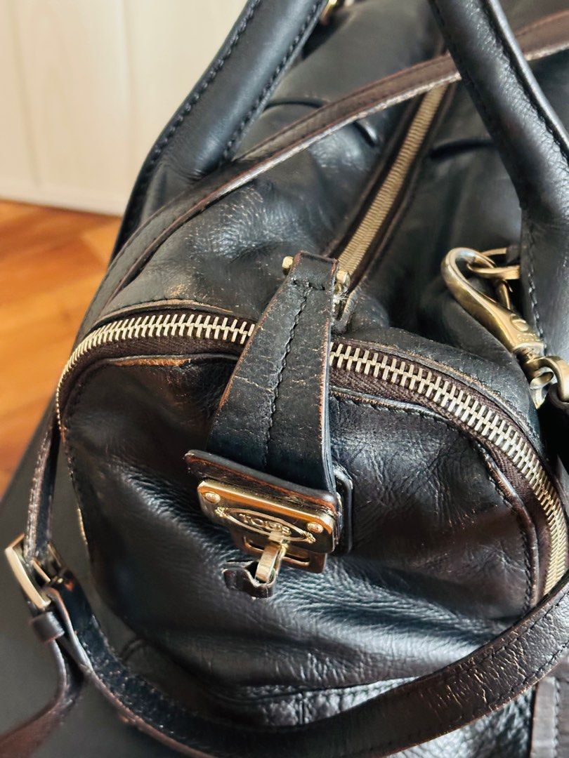 Vintage Tod's D Bag (Category: Luxury Bags & Wallets) located in Taguig. Submitted by marjorieco (Listing ID 1414669173, Image 3). Description: No cracks in leather. Some Color fading is visible as the bag was Re-colored to black by Vintage Restore. Original color was khaki. .