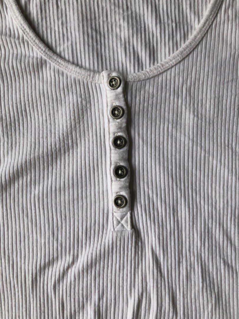 white hollister henley bodysuit (Category: Others Tops) located in Quezon City. Submitted by gridkats (Listing ID 1414736204, Image 3). Description: white hollister henley bodysuit 🏷️₱500 - xs-s (s on tag) - vv sexy and flattering - soft fabric - no ww! i don't want anyone to assume that i pinned the crotch 🙄 - flaws: some lints since the material is cotton dimensions: 🤍 bust: 29" 🤍 wl: 23" .
