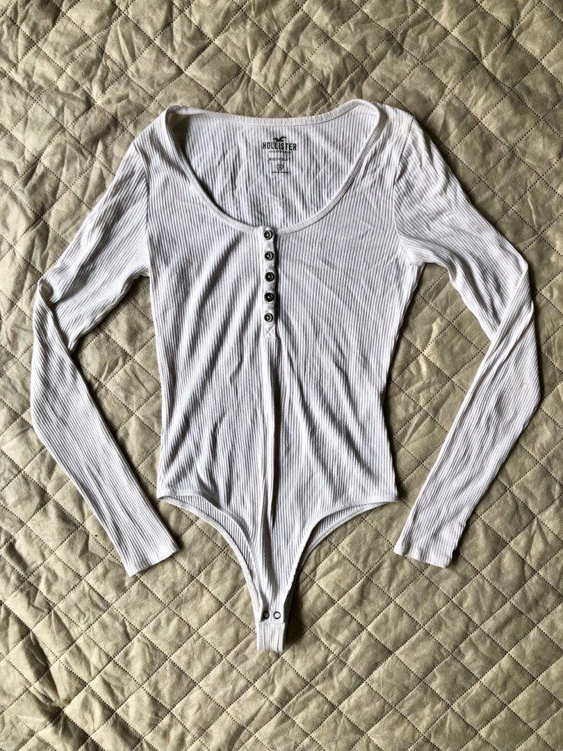 white hollister henley bodysuit (Category: Others Tops) located in Quezon City. Submitted by gridkats (Listing ID 1414736204, Image 1). Description: white hollister henley bodysuit 🏷️₱500 - xs-s (s on tag) - vv sexy and flattering - soft fabric - no ww! i don't want anyone to assume that i pinned the crotch 🙄 - flaws: some lints since the material is cotton dimensions: 🤍 bust: 29" 🤍 wl: 23" .