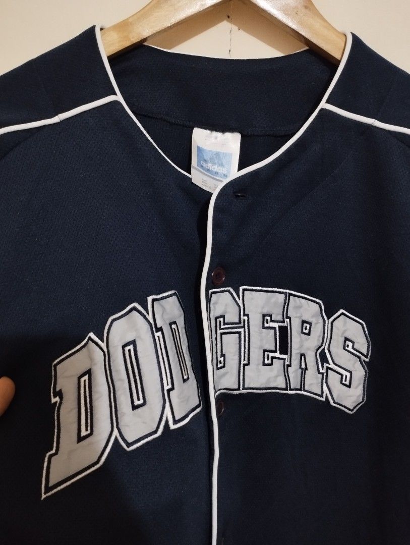 Adidas Dodgers Baseball Jersey (Category: Tshirts & Polo Shirts ) located in Manila. Submitted by thriftvibes324 (Listing ID 1414835562, Image 3). Description: dimes: 28Lx22W colorate: 9.8/10✨ Issue: missing 1 button.