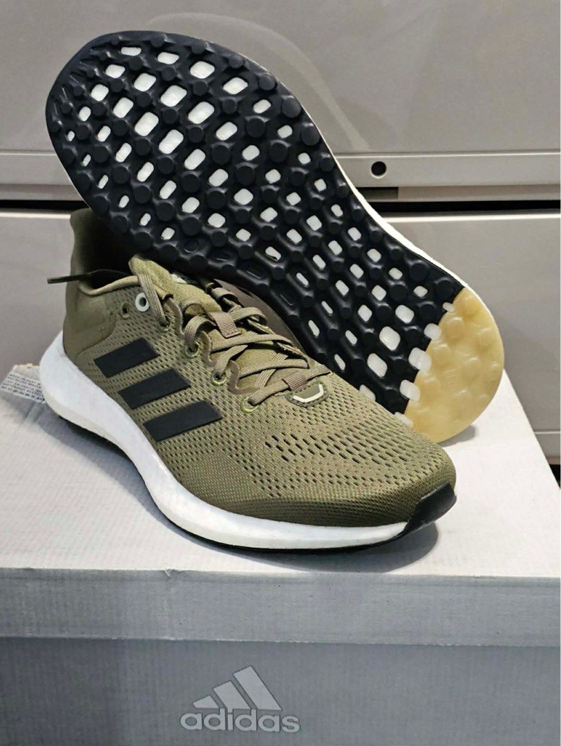 Adidas Pureboost 21 Olive Running Shoes (Category: Sneakers) located in Quezon City. Submitted by tinperen (Listing ID 1414930133, Image 2). Description: - Adidas running shoes - Color: Olive green - Adidas logo on tongue and side - White sole with black accents - Includes original box - Box features "End Plastic Waste" logo ₱ 3,500 Location: Veterans Village Pasong Tamo QC Pin: Northern Legends Hobby Shop MOP: Gcash, BDO, BPI, COD Shipping: Lala