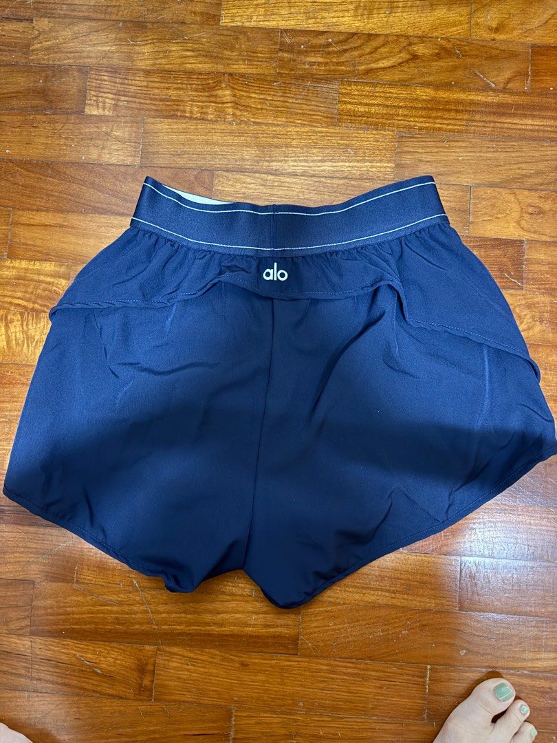 Alo Tagged Shorts (Category: Activewear) located in Singapore. Submitted by asd_26 (Listing ID 1414858486, Image 2). Description: Do not ask about the authenticity. Got it from TB. Great for everyday wear. Suitable for S size ladies. 1 for 18.Get both for 30. Black - Sold Blue - Avail.