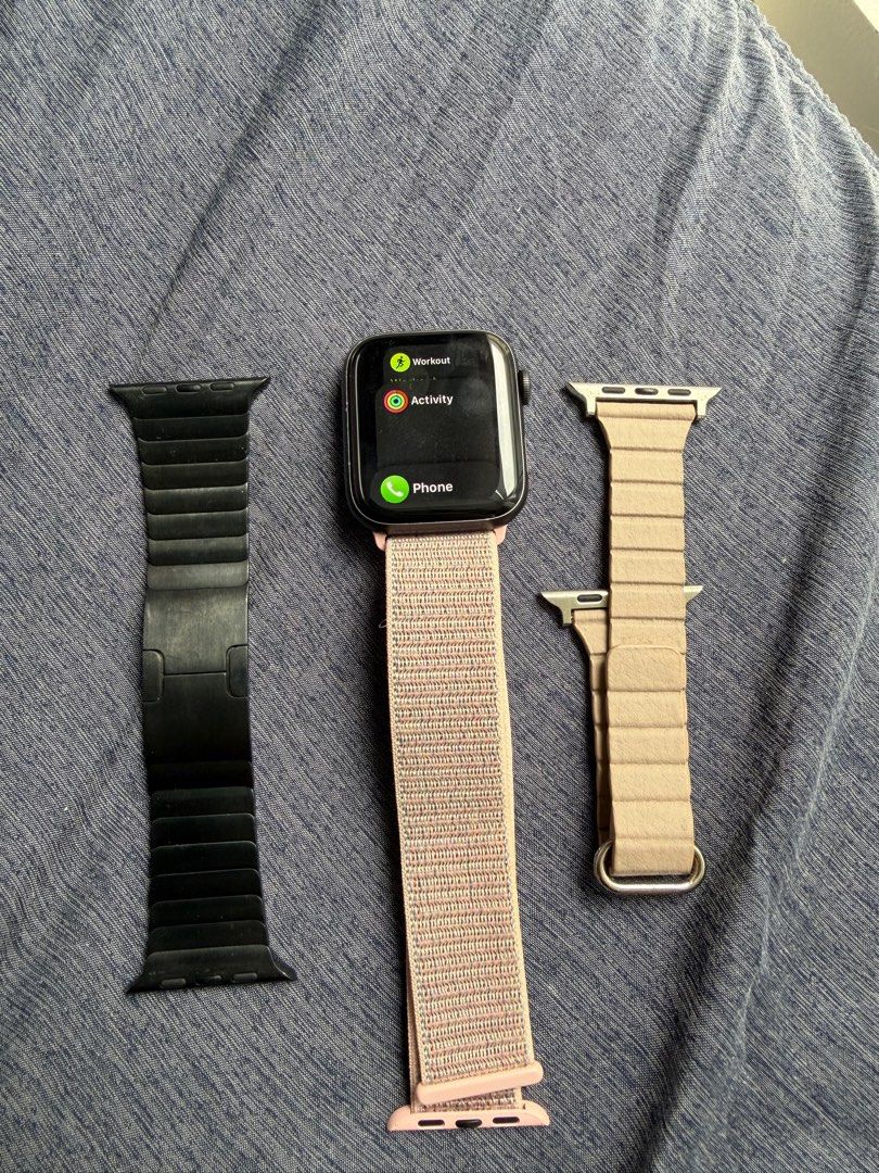 Apple Watch Series 5 44mm with Bands (Category: Wearables & Smart Watches) located in Pasay City. Submitted by prettystudio (Listing ID 1414868106, Image 1). Description: Apple Watch Series 5 44mm Includes 3 bracelets: a pink sport loop band, Beige leather magnetic band, Apple Slate Link Bracelet No box and charger.