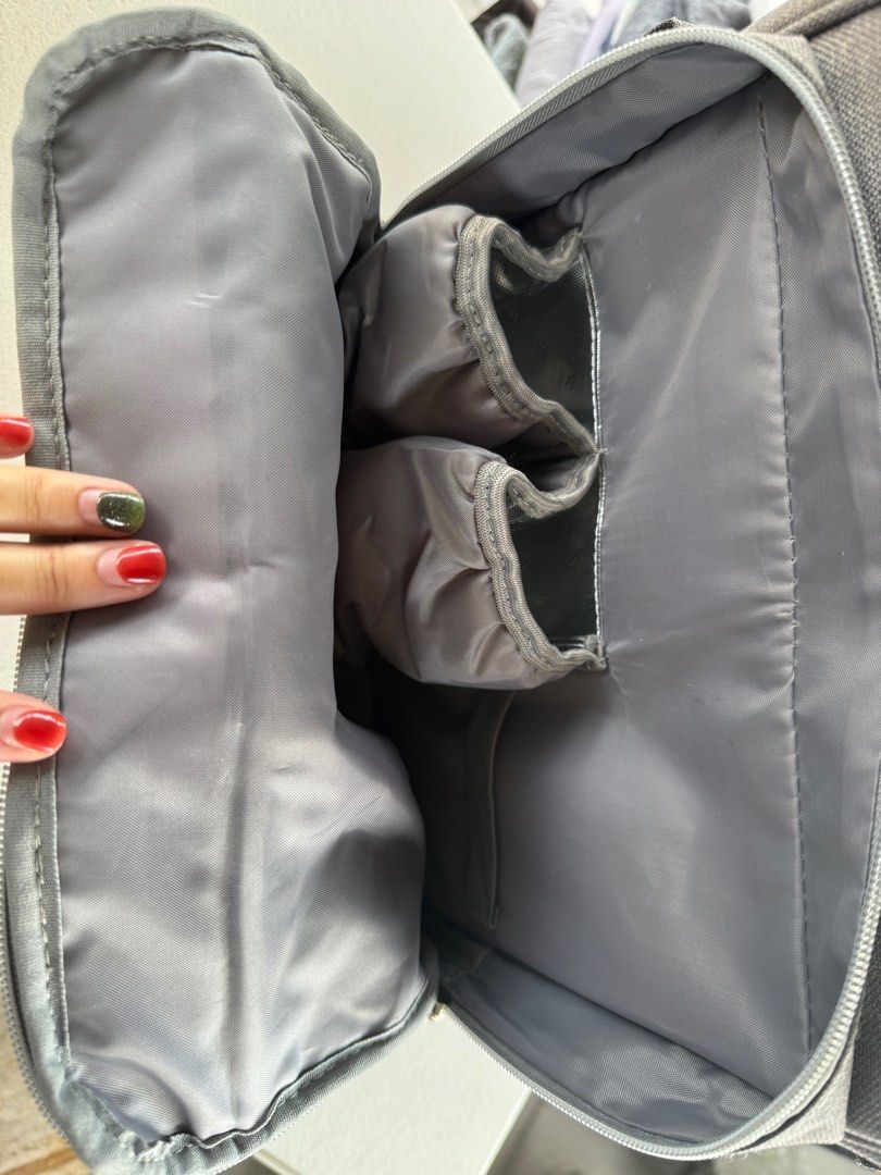 Apruva Mommy Bag - Grey (Category: Diaper Bags & Wetbags) located in Rizal. Submitted by tindahannialingpatring (Listing ID 1414873235, Image 2). Description: - Grey Apruva mommy bag - Multiple compartments and pockets for organization - Front zippered pocket - Two top handles - Adjustable shoulder straps - Insulated bottle pockets - Various interior storage compartments - Washable stain RFS: Decluttering, extra bag.