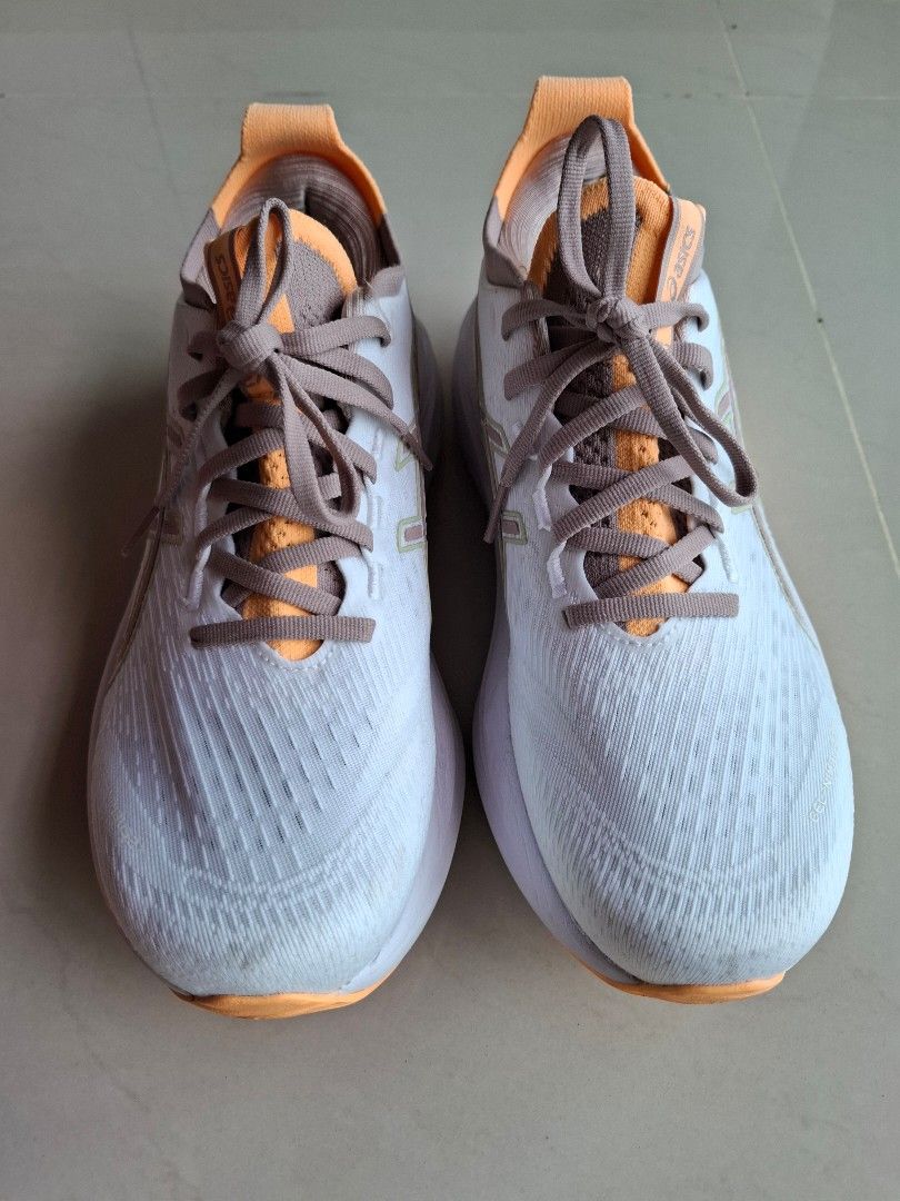 ASICS Gel-Nimbus27 Womens Running Shoes - US 8.5 (Category: Sneakers) located in Singapore. Submitted by danpty (Listing ID 1414928113, Image 1). Description: - ASICS Gel-Nimbus 27 - Size: US 8.5 - Color: White and Orange - Condition: Excellent.