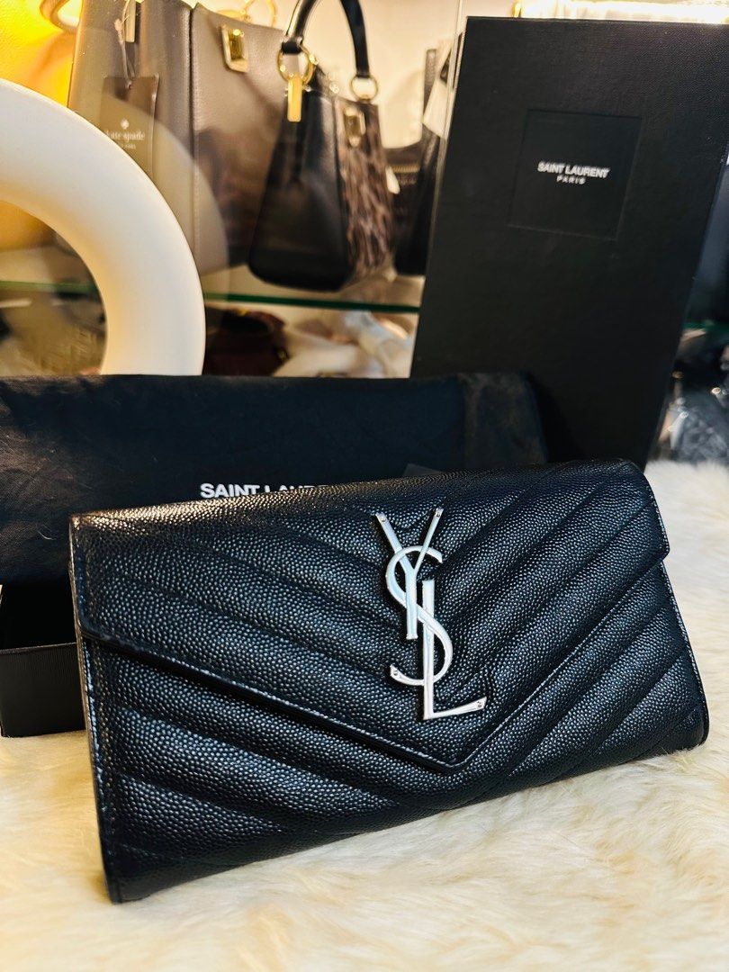 Authentic YSL Grain de Poudre Black Flap Envelope Wallet (Category: Luxury Bags & Wallets) located in Porac. Submitted by bagitupshopph (Listing ID 1339858998, Image 2). Description: Authentic YSL Grain de Poudre Black Flap Envelope Wallet Silver Hardware In very good condition No issues or whatsoever Dimensions 7.5”x4.25 Comes with box and dustbag.