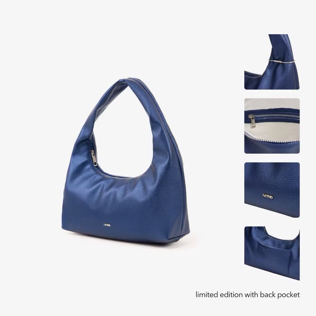 Aztrid Small Hobo Bag in Metallic Blue (Category: Shoulder Bags) located in Makati City. Submitted by krsst (Listing ID 1414876048, Image 1). Description: • No issue, good as new • No inclusion • Last price posted 📍poblacion, makati Rfs: decluttering.