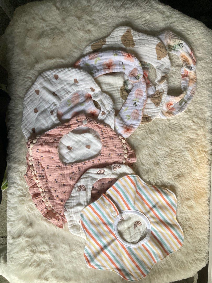 Baby Bibs - Muslin Cotton (Category: Babies & Kids Fashion) located in Quezon City. Submitted by 521shoppe (Listing ID 1414828595, Image 2). Description: - Soft muslin cotton bibs - Features stripes, hearts, and floral designs - Snap closure for easy on and off - Catches spills and drool - Keeps baby clean and comfortable - Great for everyday use or as a gift.