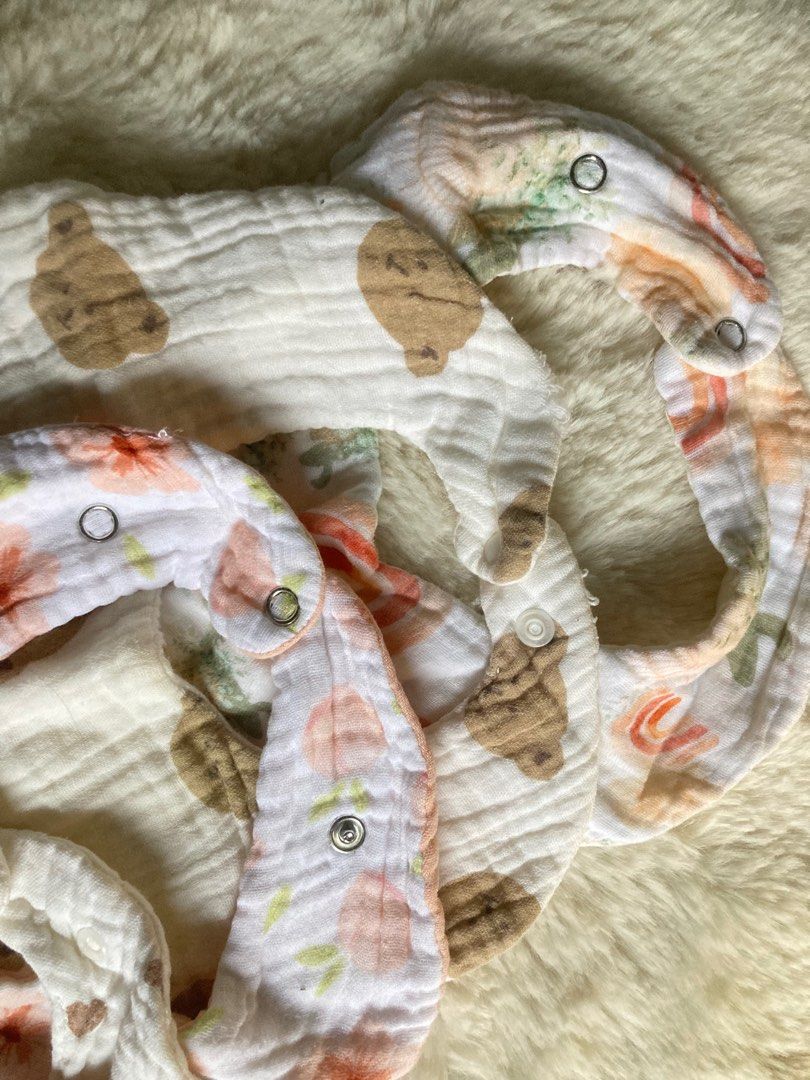 Baby Bibs - Muslin Cotton (Category: Babies & Kids Fashion) located in Quezon City. Submitted by 521shoppe (Listing ID 1414828595, Image 3). Description: - Soft muslin cotton bibs - Features stripes, hearts, and floral designs - Snap closure for easy on and off - Catches spills and drool - Keeps baby clean and comfortable - Great for everyday use or as a gift.