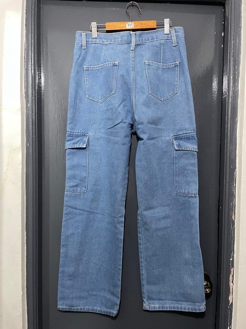 919 Denim Cargo Pants (Category: Jeans) located in General Trias. Submitted by teffispreloved (Listing ID 1415016400, Image 2). Description: - Light blue cargo jeans - comfy material, soft denim - breathable - Waist: 31 inches - Length: 39 inches - Features: - Two front pockets - Two thigh-side pockets - Two back pockets - Button and zipper closure.