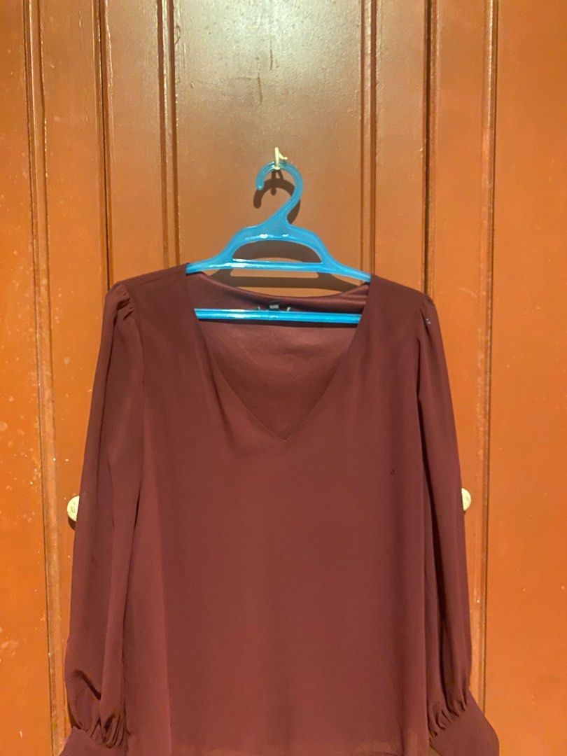 Burgundy V-Neck Long Sleeve Blouse (Category: Blouses) located in Cavite. Submitted by jp________ (Listing ID 1414947817, Image 1). Description: - Burgundy V-neck blouse - Long sleeves - Gathered cuffs - Slight sheen - Suitable for casual and semi-formal events.