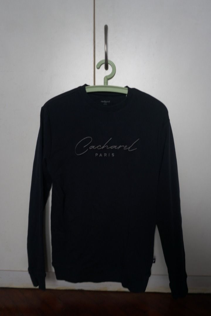 Cacharel Paris Sweatshirt - Navy Blue (Category: Coats, Jackets and Outerwear) located in Manila. Submitted by justanotherconsumer (Listing ID 1414911786, Image 1). Description: Cacharel Sweatshirt Navy Blue - Size: Small - Condition: Brand New - Dimensions: 18x26 (inches) Can do meetups around Welcome Rotonda or Lalamove if via delivery around Metro Manila, buyer shoulders sf. DM!.