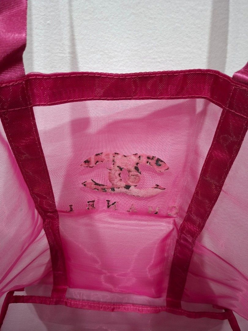 Chanel (Category: Luxury Bags & Wallets) located in Makati City. Submitted by luxxe_nina (Listing ID 1414925924, Image 3). Description: - Authentic Chanel Mesh tote bag - Vibrant pink mesh material - Iconic Chanel logo - Sturdy handles - Spacious interior - Made in China.