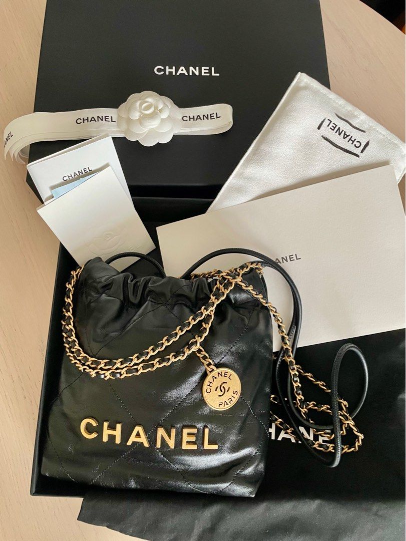 Chanel 22 Mini Bag (Category: Luxury Bags & Wallets) located in Taguig. Submitted by cloudclosetandhome (Listing ID 1414867176, Image 1). Description: Chanel 22 mini in EXCELLENT condition With COMPLETE inclusions (ORIGINAL RECEIPT, Box, Paper bag, Dust bag, ribbon, camellia) Black Calfskin with GHW Microchipped Straight payment only. 📍Location: BGC (can do meet-up) 💵 MOP: Cash, Gcash, BPI, Secbank, or UB.