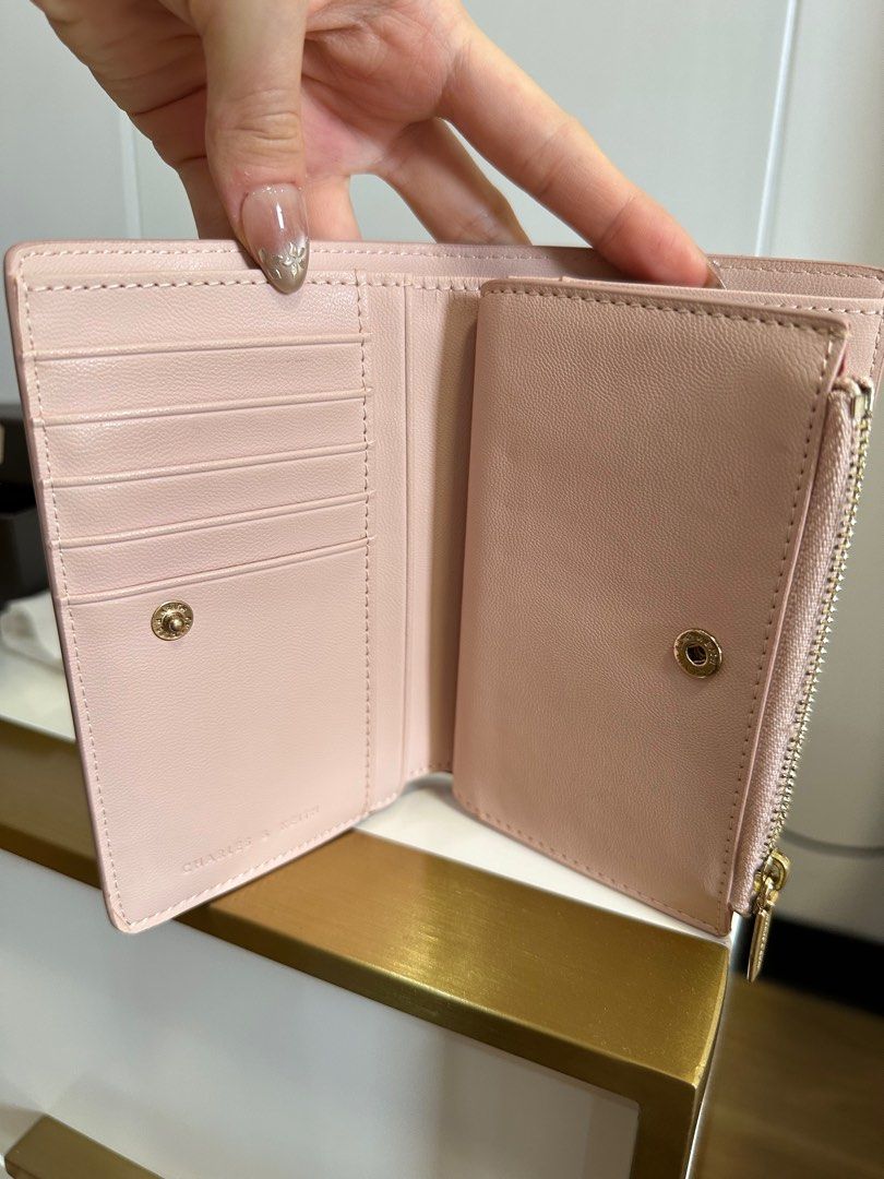 Charles & Keith Blush Wallet w/box & dustbag (Category: Wallets & Card holders) located in Caloocan City. Submitted by style.haven (Listing ID 1414865052, Image 3). Description: Bought from their physical store before! 🤩Barely used. Almost like new! No scratches! ✨easy and working magnetic locks& zipper ✨good quality leather easy to clean 🤩with its original box and dust bag .