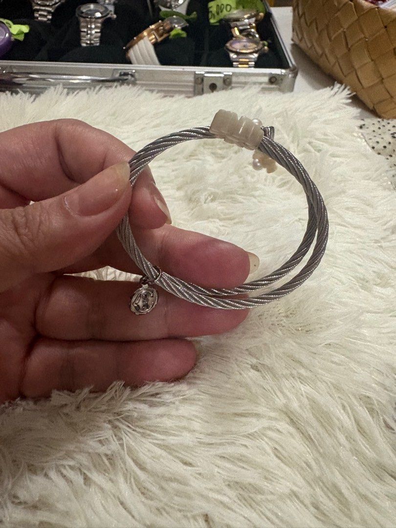 Charriol Celtic Flower Pearl bangle (Category: Luxury Accessories) located in Paranaque City. Submitted by shopofashopaholic (Listing ID 1414986908, Image 3). Description: Authentic, original Charriol Celtic Flower Pearl bangle and ring Both are triple twist Bangle - 12k Ring - 6k - SOLD Set - 16k - NOT AVAILABLE Comes with Authenticity card and original box .