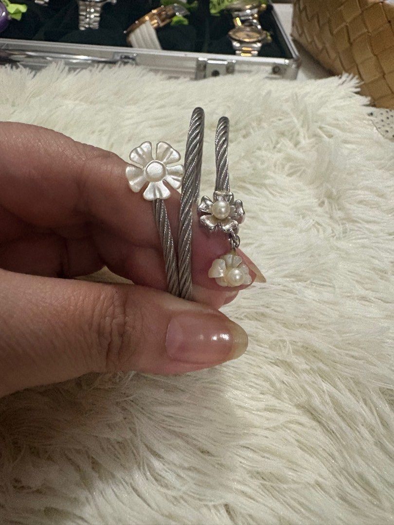 Charriol Celtic Flower Pearl bangle (Category: Luxury Accessories) located in Paranaque City. Submitted by shopofashopaholic (Listing ID 1414986908, Image 1). Description: Authentic, original Charriol Celtic Flower Pearl bangle and ring Both are triple twist Bangle - 12k Ring - 6k - SOLD Set - 16k - NOT AVAILABLE Comes with Authenticity card and original box .