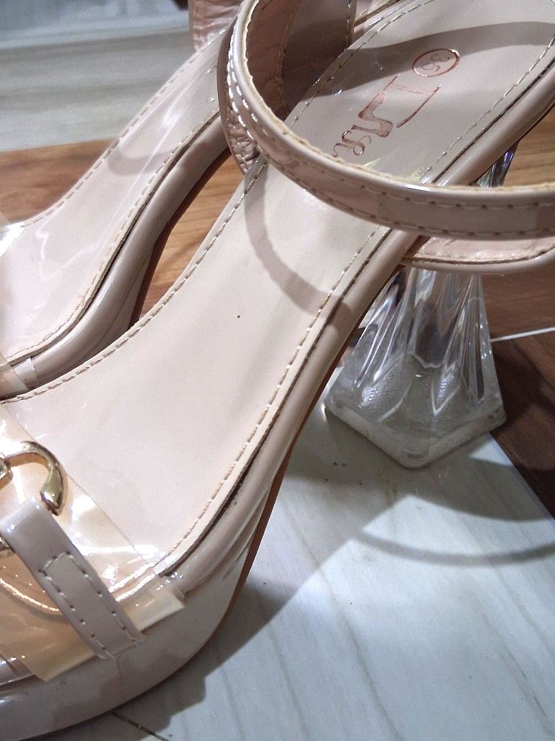 Clear Heel Sandals (Beige) (Category: Heels) located in Angeles City. Submitted by ajisclutter (Listing ID 1414898119, Image 2). Description: - Beige sandals with clear heels - Gold-colored accents - Buckle closure for secure fit - Unique clear heel design - Ideal for special occasions RFS: Need funds and probably super matagal pa bago ko kailanganin mag-wear ulit ng heels. Only wore this once during my shs graduation! My lola got it originally f