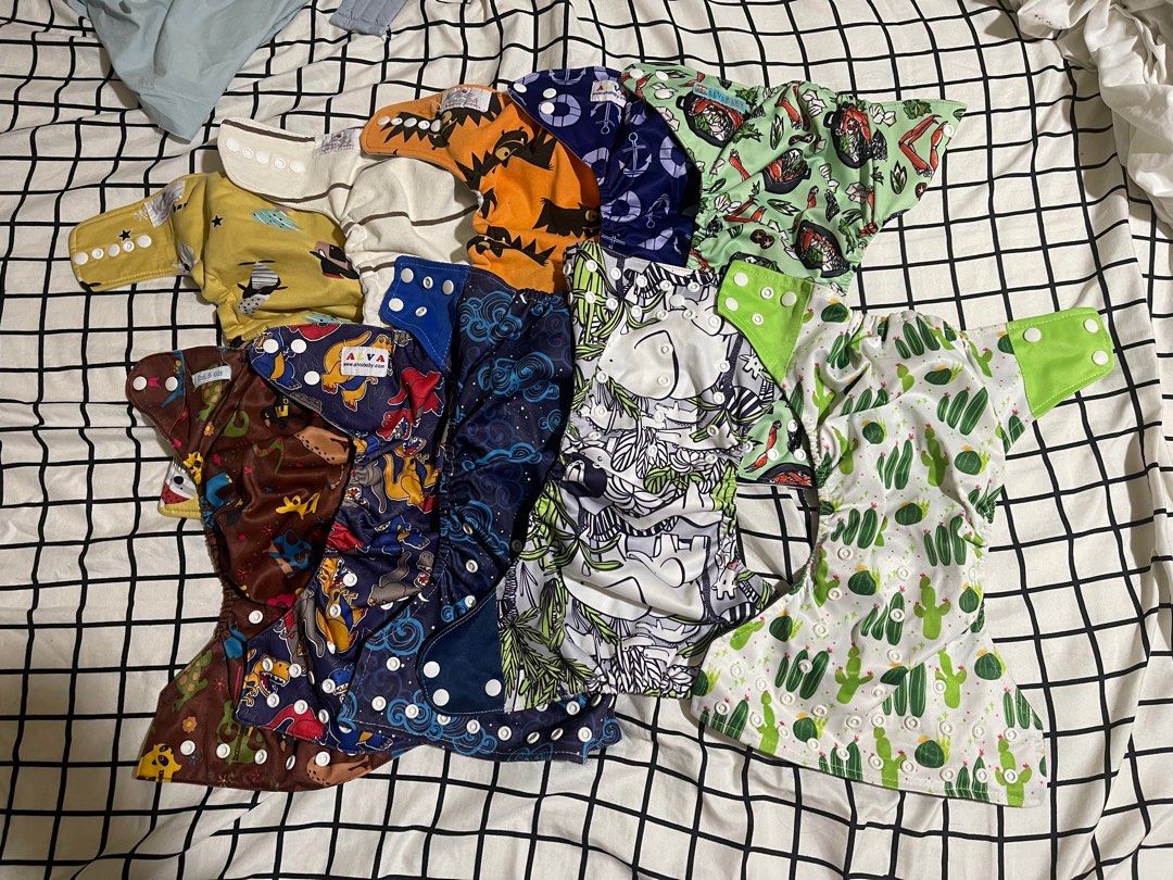 Cloth Diapers - Assorted Prints and Inserts (Category: Diapers & Baby Wipes) located in Manila. Submitted by tomtomsworld (Listing ID 1414943999, Image 1). Description: Assorted Cloth diapers with inserts 10 pcs.