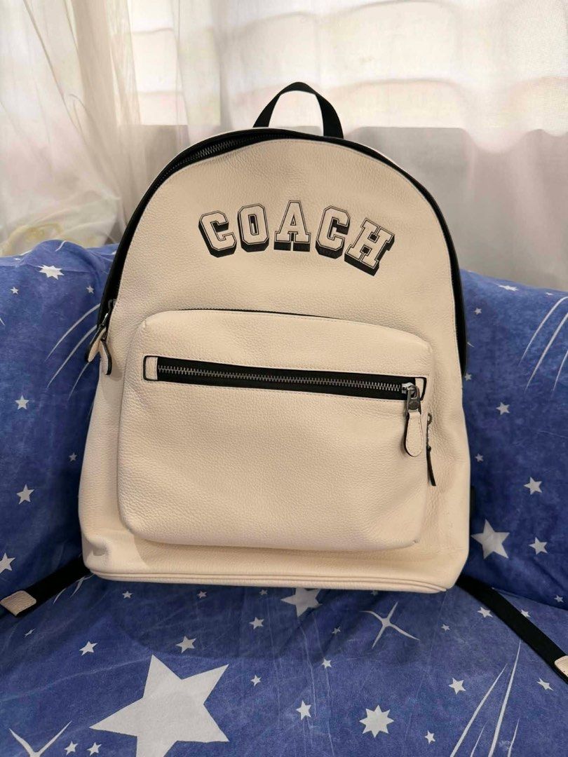 Coach White Backpack / Mini Backpack – Clean & Minimal (Category: Luxury Bags & Wallets) located in Iriga City. Submitted by kuyajude (Listing ID 1414955205, Image 1). Description: Price is negotiable Description: Authentic Coach backpack in a clean off-white/cream color with black accents. Minimal and timeless design—easy to style for casual, school, or daily use. Lightweight yet spacious enough for essentials. Details: • Brand: Coach • Color: W