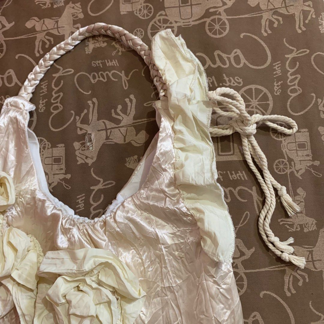 Coquette Beige Bag (Category: Luxury Bags & Wallets) located in Kabankalan. Submitted by leans_closet (Listing ID 1414910090, Image 3). Description: Coquette Beige Bag.