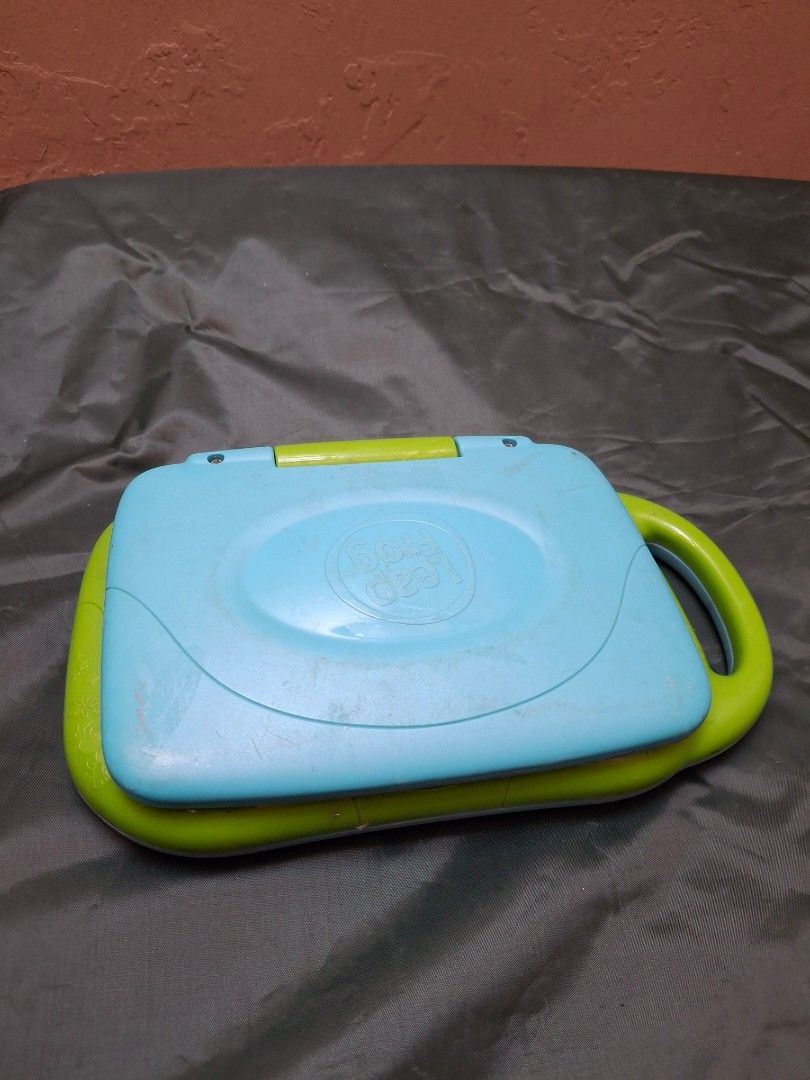 Defective LeapFrog My Pal Scout Laptop (Category: Laptops & Notebooks) located in Quezon City. Submitted by olx.jodi (Listing ID 1414877645, Image 2). Description: broken already. kinalawang na ung sa battery. can still be used for pretend play..