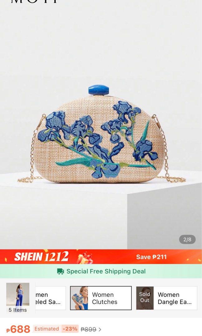 Embroidered Floral Clutch (Category: Clutches) located in Pasig City. Submitted by kathB (Listing ID 1415012611, Image 3). Description: Floral embroidered bag with a woven texture and blue clasp. Perfect size for essentials — phone, lipstick, wipes, etc. Can be carried by hand or worn with a chain, and works well for dressy or semi-formal occasions. Used only once for a wedding. Selling it for less since it loosened a bit after I overpacked it th
