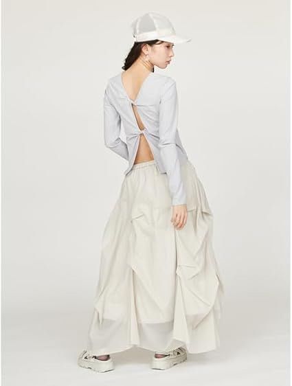 Emmi Tucked Sheer Voluminous Skirt (Category: Skirts) located in Manila. Submitted by c980_ (Listing ID 1414967450, Image 2). Description: - Emmi (JPN) - Drawstring waist - Unique gathered design - Size S (Light Gray) - No flaws - Lightweight material.