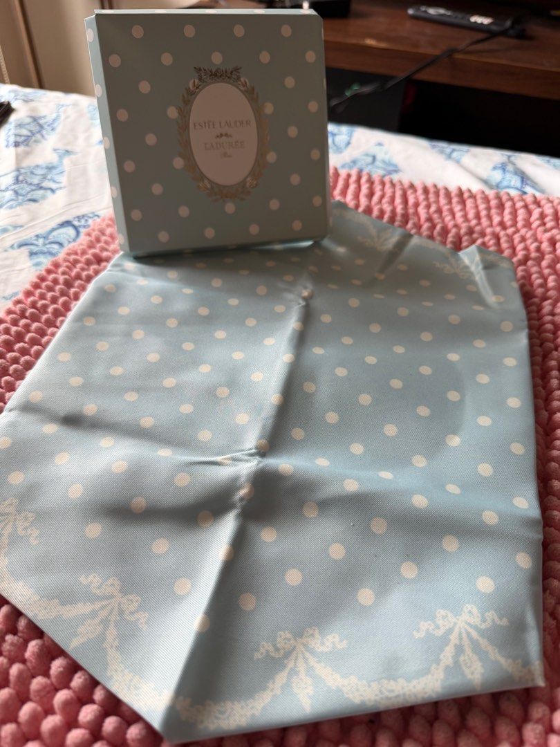 Estee Lauder Silk Scarf (blue) (Category: Makeup) located in Paranaque City. Submitted by tellimcloset23 (Listing ID 1414949623, Image 2). Description: - Estee Lauder x Laduree gift box - Light blue color with white polka dots - Decorative design - Includes matching dust bag - From Paris - Made of paper.
